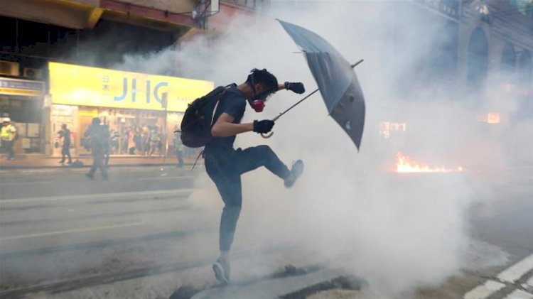 Hong Kong police fire tear gas to break up anti-government rally