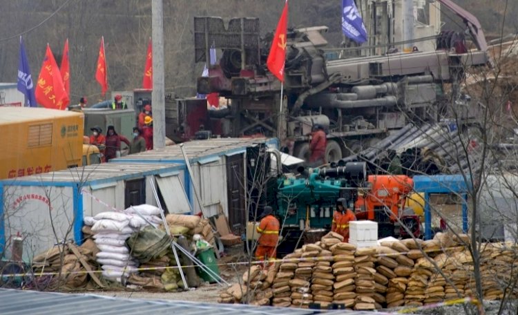 China: First Of 22 Trapped Miners From Shandong Gold Mine Rescued