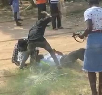 Cop-Beating Driver, Mate Detained
